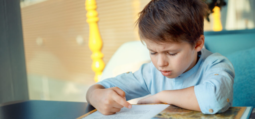 A child that is displaying labored reading. 